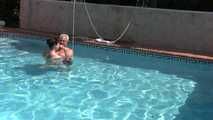 Lew Rubens and Kaecie James plays in the pool