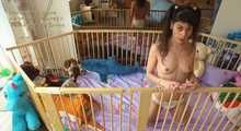 Wearing Pampers and playing in my play pen