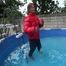 Watch Sandra enjoying the Pool during a hot summer Day with her shiny nylon Downjacket