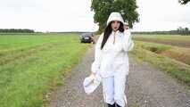 Miss Amira in KWAY rain suit