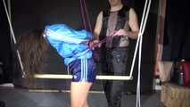 Story Part 1 of  2 Watching dark temptation during bondaging and dominating Aiyana wearing a supersexy shiny nylon shorts and a rain jacket (Video)