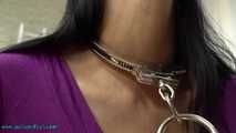 Chained and neckcuffed