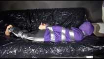 SANDRA tied and gagged with tape on a sofa wearing a sexy black shiny nylon pants and a purple rain jacket (Video)