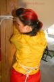 Archive girl tied, gagged and hooded by Jill both wearing sexy yellow/red Rainwear (Pics)