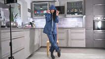 Miss Amira in blue nylon rain gear