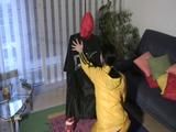 Jill tied, gagges and and double-hoodes an archive girl wearing both shiny nylon rainwear (Video)