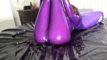 purple latex catsuit and high heels 