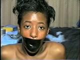 BLACK SHONDA IS WRAP TAPE GAGGED & BOUND UP WITH BLACK ELECTRICAL TAPE (D33-10)