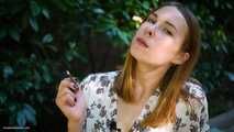 Evgeniya is smoking strong 120mm cigarette