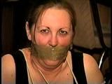 46 Yr OLD REAL ESTATE AGENT'S IS MOUTH STUFFED, WRAP TAPE GAGGED,  HANDGAGGED, TOE-TIED WEARING NYLON STOCKINGS AND IS TIGHTLY BALL-TIED WITH ROPE ON THE FLOOR (D66-06)
