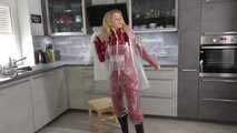 Miss Alice in Nylon rainsuit covered with transparent raingear