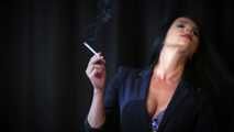 Alluring wonder woman Tanya enjoying a white 120mm cigarette