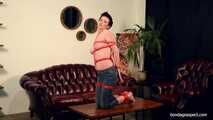 Topless and barefoot Claudia hogtied within red ropes