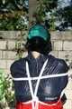 Watch Sandra bound, gagged and pantyhooded in her shiny nylon Rainwear