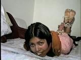 18 Yr OLD AMERICAN INDIAN COLLEGE STUDENT IS MOUTH STUFFED, HOG-TIED, CLEAVE GAGGED, BAREFOOT & TOE TIED ON HER DORM ROOM BED (D58-3)