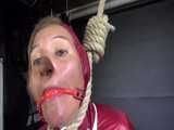 Watch Sandra bound gagged and noosed wearing her shiny nylon Rainwear