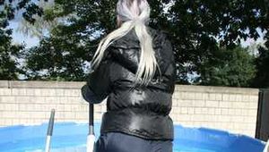 Watch Chloe enjoying the Summer in the Garden her shiny nylon Downjacket