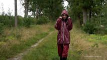 Miss Petra takes a walk in an AGU rain suit and rubber boots