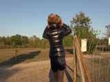 Watch Sandra enjoying her shiny nylon Downjacket at very warm Wearther outside