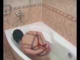 Rozanka - Sweet chick experiences bondage in the bathtub (video)