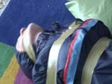 Two archive videos with girls tied and gagged in shiny nylon rainwear