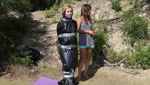 [From archive] Dana&Ketrin - Dana transported and packed in trashbags by Ketrin