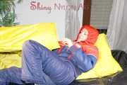 ***HOT HOT HOT*** SONJA wearing a sexy oldschool blue/red shiny nylon down suit while preparing her bed (Pics)