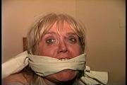 50 Yr OLD REAL ESTATE AGENT TELLS REAL LIFE BONDAGE STORY, IS  HANDGAGGED, MOUTH STUFFED, CLEAVE GAGGED< F0RCED TO CHANGE CLOTHS, HOG-TIED ON BED & TIE-TIED WHILE WEARING SWEATY STINKY PANTYHOSE (D68-1)