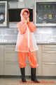 Miss Petra in AGU Regenanzug (original AGU) und darüber eine orange Adidas AGU Regenjacke. Extrem selten!
