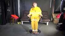 Sandra being tied and gagged on a hairdresser´s chair wearing sexy yellow shiny nylon rainwear being double hooded (Video)