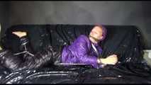 Sandra tied and gagged on a sofa wearing a shiny nylon down jacket and a rain pants (Video)