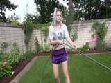 Get a video with Chloe enjoying gardening in her shiny nylon Shorts