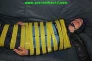 Get 328 Pictures with Katharina tied and gagged in shiny nylon rainwear from 2005-2008!