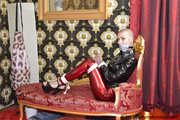 Miss Francine bound and gagged in shiny red PVC pants and PVC shirt (with making off video)