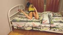 [From archive] Dana & Mishel - Mishel hogtaped on the bed by Dana (video)