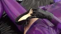 purple latex catsuit and high heels 