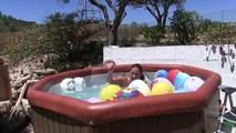 a jakuzzi full of balloons