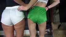 See Stella and Ronja wearing several shiny nylon Shorts!