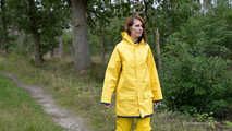 Miss Petra goes for a walk in friesennerz, yellow rain dungarees and rubber boots