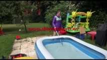 Watching Mara wearing a supersexy purple down skirt and a purple down jacket cleaning the swimming pool and playing with water (Video)