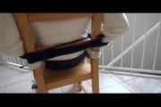 Mara tied and gagged on a chair wearing a supershiny blue down pants and a white monclear down jacket (Video)