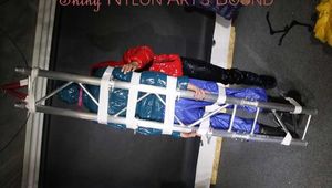 ***RONJA*** being tied and gagged with tape and a ballgag on a rack from STELLA both wearing sexy shiny nylon downwear Part 2 of 3 (Pics)