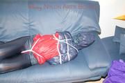 Jill tied, gagged and double hooded on a sofa wearing supersexy oldschool rainwear (Pics)
