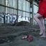 Smoking in an abandoned building barefoot