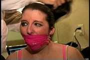 26 YEAR OLD ACTRESS IS F0RCED TO STUFF SMELLY PANTIES IN HER MOUTH, WRAP BONDAGE TAPE GAGGED, HANDGAGGED, GAG TALKING AND HOG-TIED ON THE BED (D75-8)
