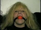 SEXY BOMBSHELL TRACY BALL-GAGS HERSELF, IS MOUTH STUFFED & HANDGAGED (D38-10)