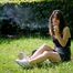 Arina is smoking 120mm cigarettes outdoors