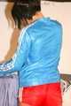 SEXY ENNI wearing a hot red shiny nylon shorts and a lightblue shiny nylon rain jacket during ironing the shirt of her boyfriend (Pics)