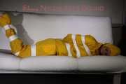 Watching Pia being tied and gagged with tape and a cloth gag wearing sexy yellow shiny nylon rainwear (Pics)