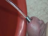 Pissing through the urethral plug